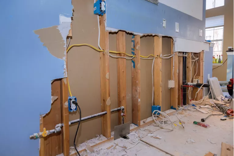 Providing repair remodeling services in kitchen of house renovation, construction new kitchen while old one is demolished
